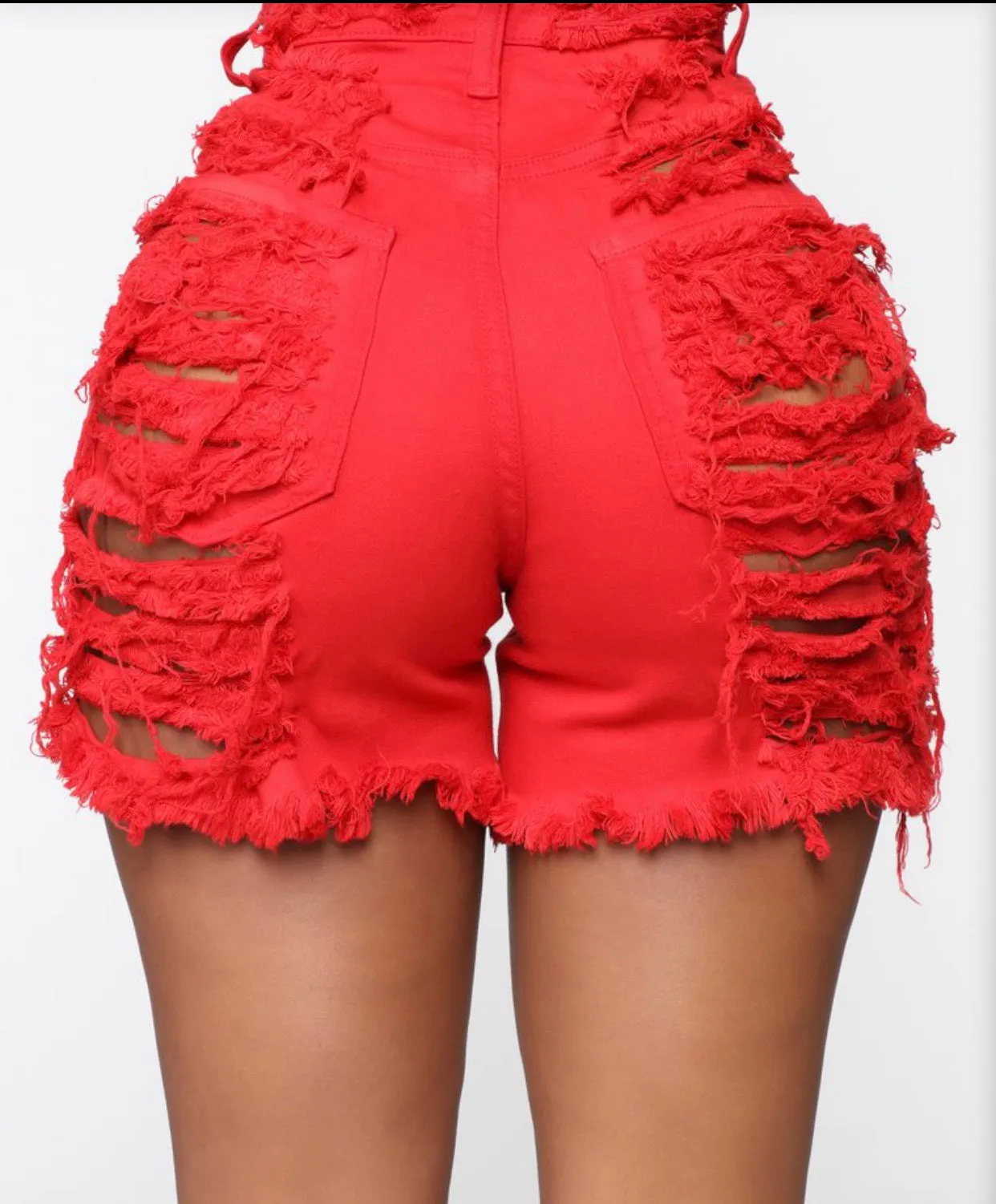 Red ripped shorts